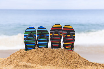 Flip flops on the sandy beach