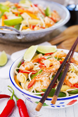 Healthy shrimp and vegetables stir-fry in a bowl, brightly lit