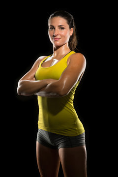 Intense determined athlete champion sweaty confident woman female powerful fighter physical trainer strong pose