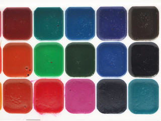watercolor paints on a white background