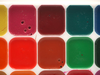 watercolor paints on a white background