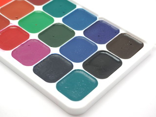 watercolor paints on a white background