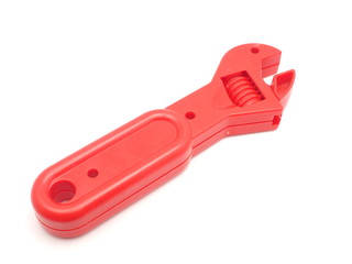 children's toy - a wrench on a white background