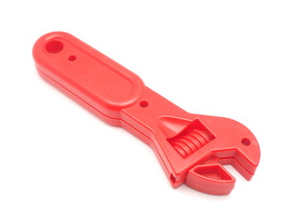 children's toy - a wrench on a white background