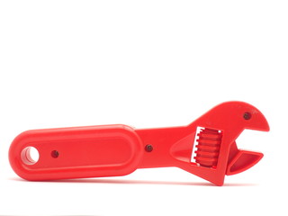 children's toy - a wrench on a white background