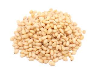 Peeled pine nuts on a white background