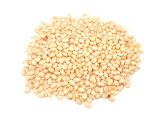 Peeled pine nuts on a white background