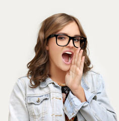 Portrait of beautiful girl screaming at the camera 