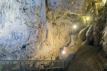 Cave in Antiparos island in Greece with stalactites and stalagmites.