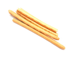 sweet flour straws on a white background