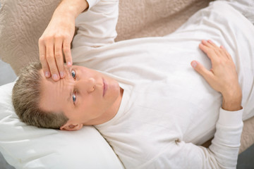 Senior man speaking with psychologist 