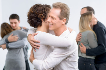 Psychologist working with group of people