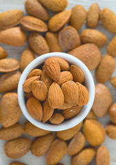almonds on wooden surface