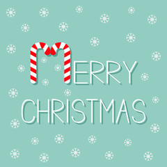 Merry Christmas Candy Cane text. Snowflake. Flat design. Blue background.