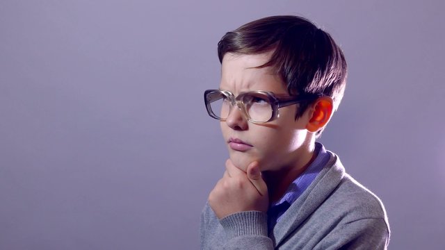 boy teenager nerd portrait think problem schoolboy glasses