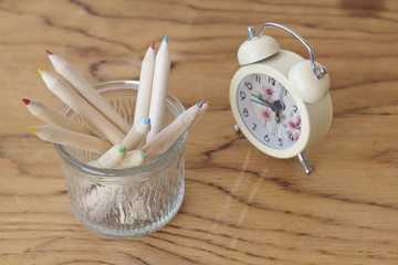 Stock Photo:.Closeup, crayons on wood background