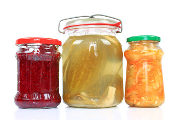 Fototapeta na wymiar Jars with pickled vegetables