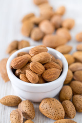almonds on wooden surface