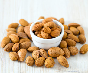 almonds on wooden surface