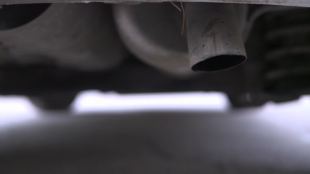 The Exhaust Gases From The Muffler