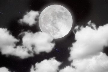 Fototapeta na wymiar Peaceful background, night sky with full moon, stars, beautiful clouds. 