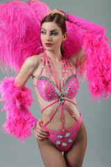beautiful dancer posing on studio background