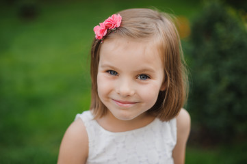 portrait of beautiful young girl with blond hair