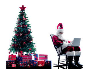 santa claus laptop computer  silhouette isolated