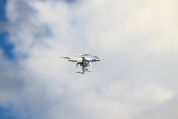 Fototapeta na wymiar flying drone on the sky