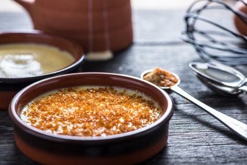 Creme brulee in rustic porcelain pot