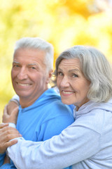 Senior couple in autumn park