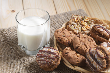 Cookies and a glass with milk