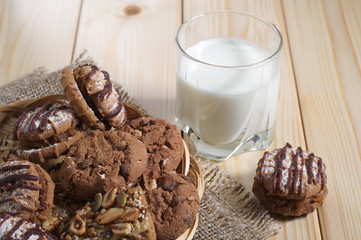 Cookies and a glass with milk