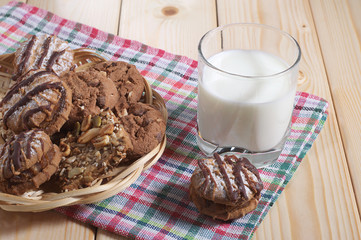 Glass with milk and cookies