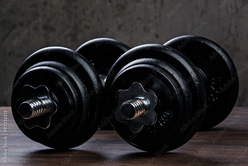 Wall mural Heavy black dumbbells