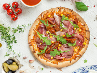 Delicious italian pizza served on wooden table