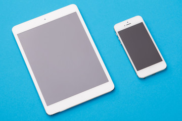 White smart phone and tablet