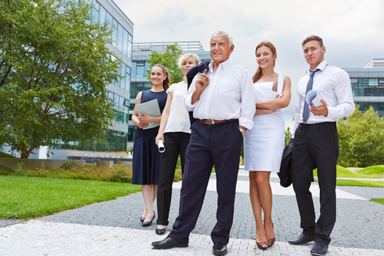 Senior Business Man Taking Leadership For Team