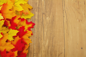 Autumn Leaves and Weather Wood Background