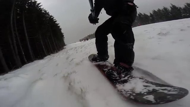 Snowboarding ollie regular with selfie stick