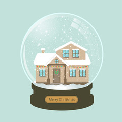 christmas snow globe and house