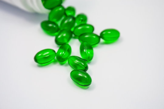 soft gel capsule vitamins pills in green color