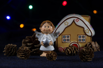 Little Christmas angel with a silver star.