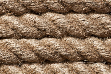 A DLSR photo of an old vintage rope. Natural warm light