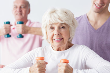 Fit senior lady at gym