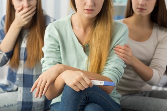 Teenage Girl With Pregnancy Test