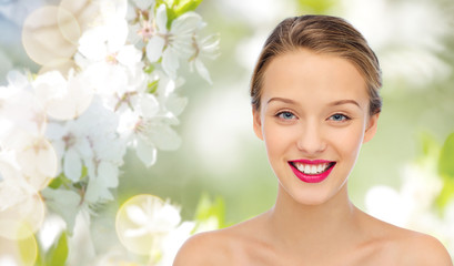 smiling young woman face and shoulders