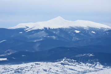 Fototapeta na wymiar Mountain top in snow