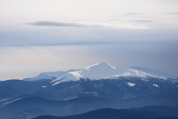 Mountain top under snow