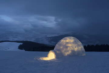 Snow igloo in the mountains